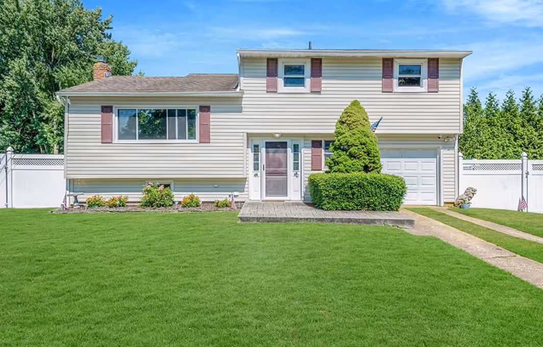 J&A Homes 4-bedroom colonial where client bought house in Selden NY